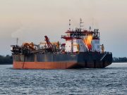 Ship on the river through a window